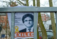 A portrait of Carles Puigdemont is attached behind the fence of the prison in Neumuenster, northern Germany, where the former Catalan president is being held pending a ruling on extradition to Spain.