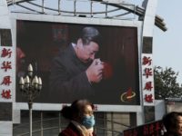 China Politics Hopes Dashed In this Nov. 16, 2017, photo, women walk by a TV screen showing a documentary footage of Chinese President Xi Jinping visiting a villager's house with a picture of late communist leader Mao Zedong, at the Beijing railway station in Beijing. Many Western scholars who studied China believed that the opening to the outside world engineered by reformer Deng Xiaoping in the early 1980s would pave the way for corresponding political freedoms. That vision has been categorically shattered under President Xi Jinping, who many once thought would be the next great reformer. In just five years, Xi has consolidated more power than any Chinese leader since Mao Zedong and is now primed to rule as president for life. (AP Photo/Andy Wong)
