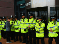 Police block the entrance to Alder Hey childrens hospital in Liverpool, northwest England as supporters of British toddler Alfie Evans try to storm the hospital following the announcement that the European court of human rights refused to intervene in his case on April 23, 2018. - Alfie Evans, who is 22 months old, has a rare degenerative neurological condition which has not been definitively diagnosed. His parents, Tom Evans and Kate James, have fought a legal battle to stop the Alder Hey Children's Hospital in Liverpool, northwest England, from turning off his ventilator. (Photo by Paul ELLIS / AFP) (Photo credit should read PAUL ELLIS/AFP/Getty Images)