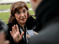 Syrian senior presidential advisor Buthaina Shaaban gestures as she answers a question from a journalist on Syrian peace talks at the United Nations on January 29, 2014 in Geneva. Syria's opposition said peace talks with President Bashar al-Assad's regime in Geneva took a step forward on January 29 with discussions on a transitional government after four days of deadlock. AFP PHOTO / FABRICE COFFRINI (Photo credit should read FABRICE COFFRINI/AFP/Getty Images)