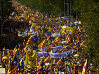 Demonstrators wave esteladas or independence flags in Barcelona, Spain, Sunday, April 15, 2018, during a protest in support of Catalonian politicians who have been jailed on charges of sedition. Tens of thousands of Catalan separatists rallied in downtown Barcelona Sunday to demand the release of high-profile secessionist leaders being held in pre-trial detention. (AP Photo/Emilio Morenatti)