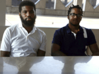 Rashon Nelson, left, and Donte Robinson, right, both 23, sit in their attorney's conference room as they pose for a portrait following an interview with the Associated Press Wednesday April 18, 2018 in Philadelphia. Their arrests at a local Starbucks quickly became a viral video and galvanized people around the country who saw the incident as modern-day racism. In the week since, Nelson and Robinson have met with Starbucks CEO Kevin Johnson and are pushing for lasting changes to ensure that what happened to them doesn't happen to future patrons. They are also still processing what it means to have had an everyday encounter escalate into a police confrontation. (AP Photo/Jacqueline Larma)