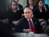 WASHINGTON, DC - FEBRUARY 26: Environmental Protection Agency Administrator Scott Pruitt listens as President Donald Trump speaks during a meeting with the members of the National Governors Association in the State Dining Room of the White House in Washington, DC on Monday, Feb. 26, 2018. (Photo by Jabin Botsford/The Washington Post via Getty Images)