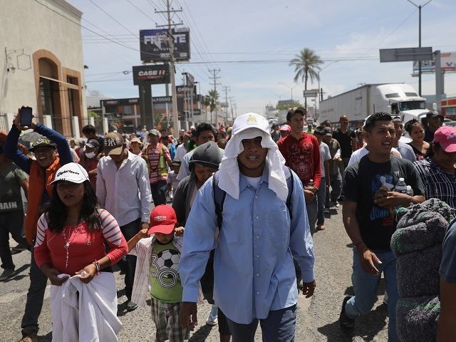 HERMOSILLO, MEXICO - APRIL 23: Central American immigrants, part of an immigrant "caravan," march in protest against U.S. President Donald Trump on April 23, 2018 in Hermosillo, Mexico. They demonstrated against Trump's morning tweets calling for U.S. Homeland Security to stop them from crossing the border into the United States …