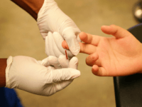 MIAMI, FL - JUNE 27: A medical assistant draws blood from a patient on National HIV Testing Day at a Planned Parenthood health center on June 27, 2017 in Miami, Florida. Planned Parenthood and other health care providers are offering the free service during the annual event in hopes of encouraging people to get tested for HIV and become educated about their status. (Photo by Joe Raedle/Getty Images)