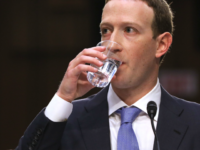 Mark Zuckerberg drinking