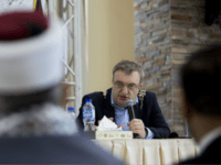 Dublin Mayor Micheal Mac Donncha speaks in a conference in the West Bank city of Ramallah, Wednesday, April 11, 2018. Israeli authorities are investigating how Donncha arrived in the country despite instructions to bar his entry. (AP Photo/Majdi Mohammed)