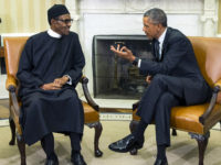 FILE- In this Monday, July 20, 2015 file photo, President Barack Obama, right, meets with Nigerian President Muhammadu Buhari, in the Oval Office of the White House, in Washington. Bomb blasts at two bustling bus stations killed 29 people and wounded 105, officials said Thursday, July 23, 2015, after Nigerias new president warned that the U.S. refusal to sell his country strategic weapons is “aiding and abetting” Boko Haram. (AP Photo/Evan Vucci file)