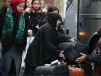 ROTHESAY, ISLE OF BUTE, SCOTLAND - DECEMBER 04: Syrian refugee families arrive at their new homes on the Isle of Bute on December 4, 2015 in Rothesay, Isle of Bute, Scotland. The Isle of Bute is welcoming 15 Syrian Refugee families as part of the governments plant to give refuge to 20,000 refugees in the UK by 2020. The Isle of Bute, on the Cowal peninsular, has a population of 6,498 which swells in the Summer months due to tourism. The island has been nicknamed the 'Madeira of Scotland' (Photo by Christopher Furlong/Getty Images)