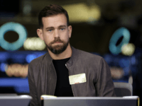 This photo taken Nov. 19, 2015, shows Square CEO Jack Dorsey being interviewed on the floor of the New York Stock Exchange. Facebook COO Sheryl Sandberg and Twitter CEO Dorsey won't stand for re-election to the board of The Walt Disney Co. A Disney spokesperson says it has become "increasingly difficult for them to avoid conflicts relating to board matters." With Disney planning to put ESPN online and Twitter live-streaming sports like NFL football, online video is surely an area of overlap. (AP Photo/Richard Drew, File)