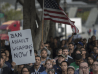 A sign calling for a ban on assault type weapons is held at a vigil for the worst mass shooing in United States history on June 13, 2016 in Los Angeles, United States. A gunman killed 49 people and wounded 53 others at a gay nightclub in Orlando, Florida early yesterday morning before suspect Omar Mateen also died on-scene. (Photo by David McNew/Getty Images)