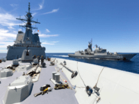 HMA Ships Anzac and Hobart perform a replenishment at sea off the east coast of Australia.