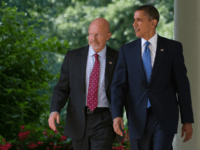 S President Barack Obama walks back down the West Wing Colonnade alongside retired General James Clapper, Obama's nominee for director of national intelligence, before making a statement in the Rose Garden of the White House in Washington, DC, June 5, 2010. AFP PHOTO / Saul LOEB (Photo credit should read SAUL LOEB/AFP/Getty Images)