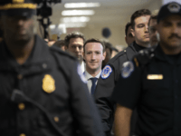 Facebook CEO Mark Zuckerberg arrives on Capitol Hill in Washington, Monday, April 9, 2018, to meet with Sen. Dianne Feinstein, D-Calif., the ranking member of the Senate Judiciary Committee. Zuckerberg will testify Tuesday before a joint hearing of the Commerce and Judiciary Committees about the use of Facebook data to target American voters in the 2016 election. (AP Photo/J. Scott Applewhite)