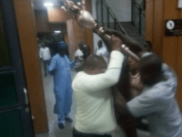 Intruders seize the symbol of authority of the upper house of Parliament, the mace, in the Senate, Nigeria, April 18, 2018. (Twitter/TVC News)
