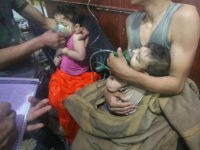 DAMASCUS, SYRIA - APRIL 07: An affected Syrian child receives medical treatment after Assad regime forces allegedly conducted poisonous gas attack to Duma town of Eastern Ghouta in Damascus, Syria on April 07, 2018. (Photo by Halil el-Abdullah/Anadolu Agency/Getty Images)