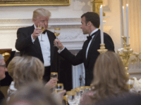 U.S. President Donald Trump shares a toast with French President Emmanuel Macron during the State Dinner for Macron and Mrs. Brigitte Macron of France during a visit to The White House, April 24, 2018 in Washington, DC. Trump is hosting Macron for a two-day official visit that included dinner at George Washington's Mount Vernon, a tree planting on the White House South Lawn and a joint news conference. (Photo by Chris Kleponis-Pool/Getty Images)