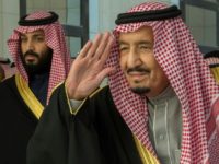 A handout picture provided by the Saudi Royal Palace on December 13, 2017, shows Saudi King Salman bin Abdulaziz (R) and Saudi Crown Prince Mohammed bin Salman in Riyadh