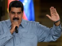 Venezuelan President Nicolas Maduro speaks during the commemoration of the 50th anniversary of the assassination of US activist Martin Luther King Jr. at the Miraflores presidential palace in Caracas on April 4, 2018