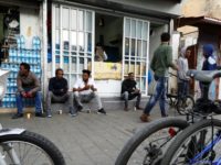 African migrants from Eritrea sit in the street in the southern district of Israel's Tel Aviv on April 5, 2018