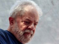 Brazilian ex-president (2003-2011) Luiz Inacio Lula da Silva, seen gesturing during a Catholic mass in memory of his late wife Marisa Leticia on April 7, 2018, has begun serving a 12 year sentence for corruption