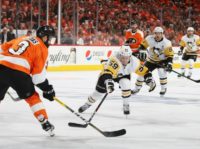 Jake Guentzel scored four unanswered goals, including two just 10 seconds apart, as the Penguins defeated the Flyers 8-5 to reach the second round of the playoffs