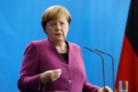 German Chancellor Angela Merkel gestures during a news conference on April 12, 2018 at the Chancellery in Berlin