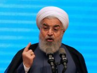 Iran's president Hassan Rouhani gives a speech in the city of Tabriz in the northwestern East-Azerbaijan province on April 25, 2018, during an event commemorating the city as the 2018 capital of Islamic tourism