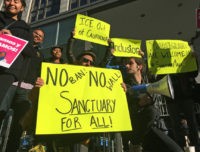 California Sanctuary Backlash In this April 14, 2017, file photo, protesters rally outside a courthouse where a federal judge heard arguments in the first lawsuit challenging President Donald Trump's executive order to withhold funding from communities that limit cooperation with immigration authorities in San Francisco. U.S. District Judge William Orrick on Monday, March 5, 2018, rejected the state's request for a preliminary injunction to turn over the money. More local governments in California are resisting the state's efforts to resist the Trump administration's immigration crackdown, and political experts see politics at play as Republicans try to fire up voters in a state where the GOP has grown weak. (AP Photo/Haven Daley, File) The Latest: San Diego County mulls 'sanctuary' law action