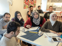 KLADESHOLMEN, SWEDEN - FEBRUARY 10: Refugees attend to Swedish language class at the temporary house for asylum seekers of the Vattendroppen school on February 10, 2016 in Kladesholmen, Sweden. Last year Sweden received 162,877 asylum applications, more than any European country proportionate to its population. According to the Swedish Migration Agency, Sweden housed more than 180,000 people in 2015, more than double the total in 2014. The country is struggling to house refugees in proper conditions during the harsh winter; summer holiday resorts, old schools and private buildings are being turned into temporary shelters for asylum seekers as they wait for a decision on their asylum application. Sweden is facing new challenges on its migration policy after the massive arrival of refugees last year, forcing the country to drastically reduce the number of refugees passing through its borders. Stricter controls have had a significant effect on the number of arrivals, reducing weekly numbers from 10,000 to 800. The Swedish migration minister announced in January that the government will reject up to 80,000 refugees who applied for asylum last year, proposing strict new residency rules. (Photo by David Ramos/Getty Images)