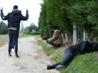 GettyImages-857784354 Sudanese migrants wait or sleep on the side of a road in Ouistreham, near Caen, northwestern France on October 5, 2017. Migration is a hot button issue in Europe and politicians are under pressure to bring down the number of asylum seekers after hundreds of thousands of migrants flooded the …