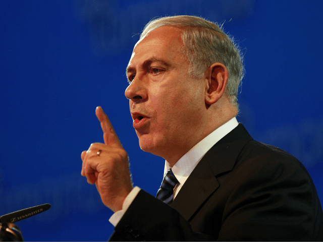 Israeli Prime Minister Benjamin Netanyahu gestures as he delivers a speech during the Israel Presidential Conference in Jerusalem on June 20, 2013. Europe must take a firmer line with Iran over its controversial nuclear programme, Israeli Prime Minister Benjamin Netanyahu said at the start of a working meeting with EU â¦