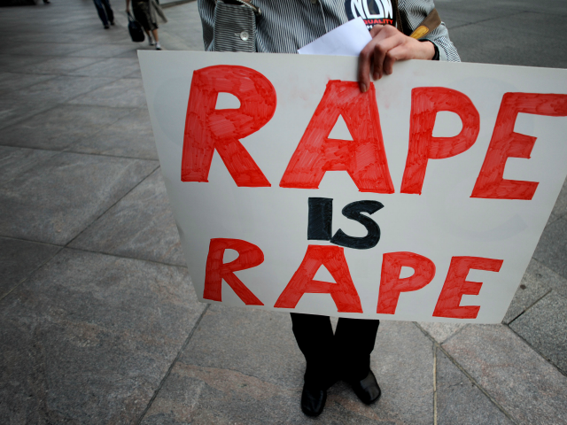 Feminist leaders and activists hold a protest in front of the International Monetary Fund (IMF) Headquarters demanding that IMF Managing Director Dominique Strauss-Kahn be removed from his post in Washington, DC, on May 18 2011. Strauss-Kahn resigned his post via a letter sent from jail on May 18. AFP PHOTO/STR â€¦