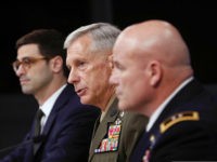 Marine Gen. Thomas D. Waldhauser, commander, U.S. Africa Command, center, with Assistant Secretary of Defense for International Security Affairs Robert S. Karem, left, and Army Maj. Gen. Roger L. Cloutier, right, chief of staff, U.S. Africa Command, and lead investigating officer, brief members of the media at the Pentagon, Thursday, May 10, 2018. The Pentagon said multiple failures are to blame for the Niger ambush that killed four U.S. service members last October, citing insufficient training and preparation as well as the teams deliberate decision to go after a high-level Islamic State group insurgent without proper command approval. (AP Photo/Pablo Martinez Monsivais)