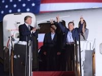 Trump welcomes Americans home (Saul Loeb / AFP / Getty)