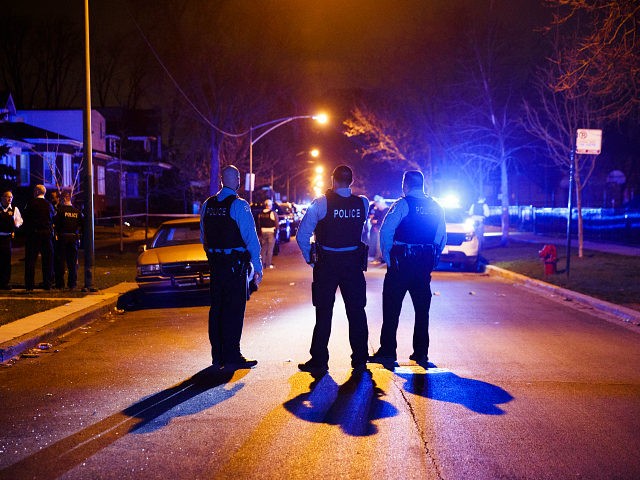 Police work the scene where two people were shot near the intersection of 60th and Maplewood Avenue Tuesday April 24, 2018 in Chicago. (Armando L. Sanchez/Chicago Tribune/TNS via Getty Images)