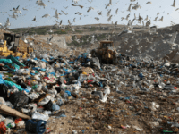 In this Wednesday, Feb. 2, 2018 file photo, earthmovers push mountains of garbage as seagulls fly over the country's largest landfill at Fyli on the outskirts of Athens. The British government is planning a consultation about a possible bill to end the use of plastic straws, drink stirrers and cotton buds - and is urging other Commonwealth nations to ban the practice as well. Prime Minister Theresa May said Thursday, April 19, 2018 that “plastic waste is one of the greatest environmental challenges facing the world.” (AP Photo/Thanassis Stavrakis, file)