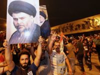 Iraq Elections Followers of Shiite cleric Muqtada al Sadr, seen in the posters, celebrate in Tahrir Square in Baghdad, Iraq, early Monday, May 14, 2018. Iraq's electoral commission announces influential Shiite cleric Muqtada al Sadr is the current front runner in national elections with official results in from just over half of the country's provinces. (AP Photo/Hadi Mizban) Followers of Shiite cleric Muqtada al-Sadr, seen in the posters, celebrate in Tahrir Square in Baghdad, Iraq, early Monday, May 14, 2018. Iraq's electoral commission announces influential Shiite cleric Muqtada al-Sadr is the current front-runner in national elections with official results in from just over half of the country's provinces. …