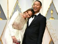 JohnACLU1 John Legend (R) and US model and wife of John Legend Chrissy Teigen arrive on the red carpet for the 89th Oscars on February 26, 2017 in Hollywood, California. / AFP / VALERIE MACON (Photo credit should read VALERIE MACON/AFP/Getty Images)