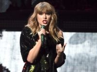 TaylorLGBTQ1 FILE - In this Dec. 8, 2017 file photo, singer Taylor Swift performs at Z100's iHeartRadio Jingle Ball at Madison Square Garden in New York. Swift surprised an 8-year-old girl at the Phoenix hospital where she has been recovering from devastating burns. The Arizona Republic reports the pop star showed …