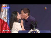 Duterte kiss KISS ON THE LIPS. President Rodrigo Duterte kisses an overseas Filipino worker during his meeting with the Filipino community in South Korea on June 3, 2018. Screenshot from PTV video
