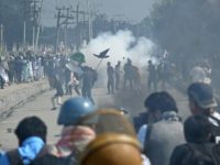 Kashmiri youths throw stones during clashes in Srinagar on June 16 Kashmiri youths throw stones during clashes in Srinagar on June 16
