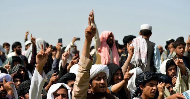 Taliban Celebrate After Beheading an Afghan Soldier 1 Taliban Celebrate After Beheading an Afghan Soldier