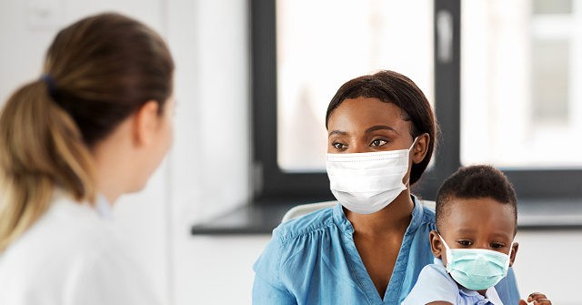 Commissioner: U.S. Civil Rights Report Fosters Minority Distrust of Doctors 1 Commissioner: U.S. Civil Rights Report Fosters Minority Distrust of Doctors