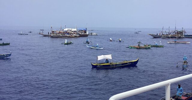 Filipino Activists And Fishermen Sail In 100 Boat Flotilla To Disputed