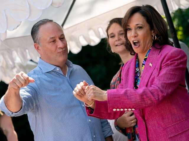 US Vice President Kamala Harris and Second Gentleman Doug Emhoff dance as DJ D-Nice perfor