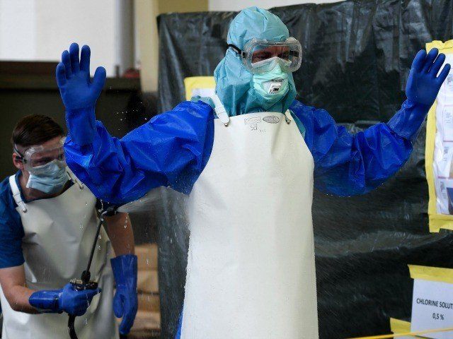 ebola-worker-hose-down-reuters