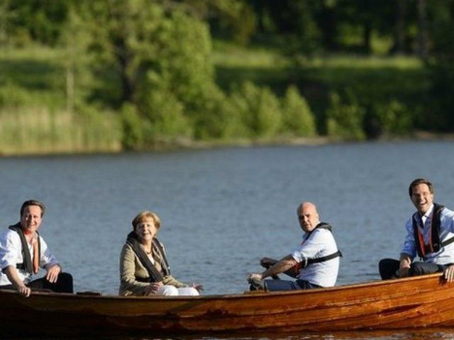 Cameron-Merkel-Boat_AFP