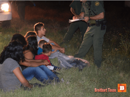 Unaccompanied Minors being processed by Border Patrol Agents near Mission, Texas.