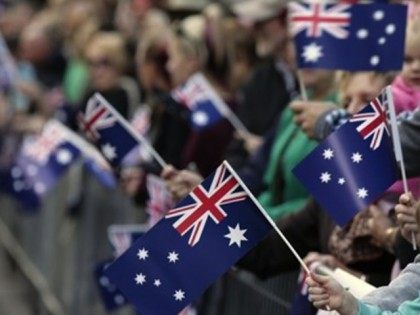 Girl holds Australian Flag at Parade